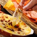 Tacos de chorizo con queso fundido